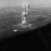 One of the newly found photos, taken by a crew member aboard the Enola Gay, shows the atomic bomb\'s mushroom cloud after the device was dropped on Hiroshima on Aug. 6, 1945. | HIROSHIMA PEACE MEMORIAL MUSEUM / VIA KYODO
