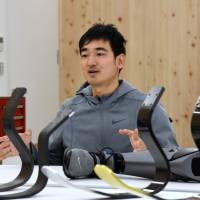 Ken Endo, president of Xiborg Co., is interviewed at the firm\'s lab at the Shin-Toyosu Brillia Running Stadium on Dec. 15. | SATOKO KAWASAKI