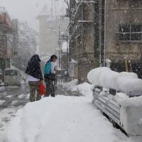 Heavy snowfall in Gosen, Niigata Prefecture. | KYODO
