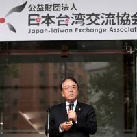 Japanese Representative to Taiwan Mikio Numata attends a name-changing ceremony for Japan\'s de facto embassy in Taipei on Tuesday. | REUTERS