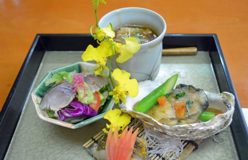 Asai Togei Seafood sculpture: The hassun platter, typically the show stealer in a kaiseki (traditional multicourse) meal, included an oyster in miso butter, and pickled saba (mackerel) served with a basil sauce | J.J. O'DONOGHUE