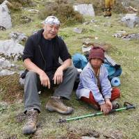 New friends: Bon Ishikawa sits with Ash Bahadur during a visit to Nepal to film his documentary, \"Sekai de Ichiban Utsukushii Mura.\" | BON ISHIKAWA