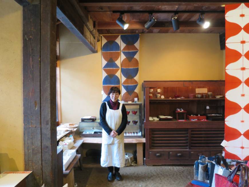 Yoko Kano, 69, stands in her small shop in Katsuyama, Okayama Prefecture on Jan. 3.