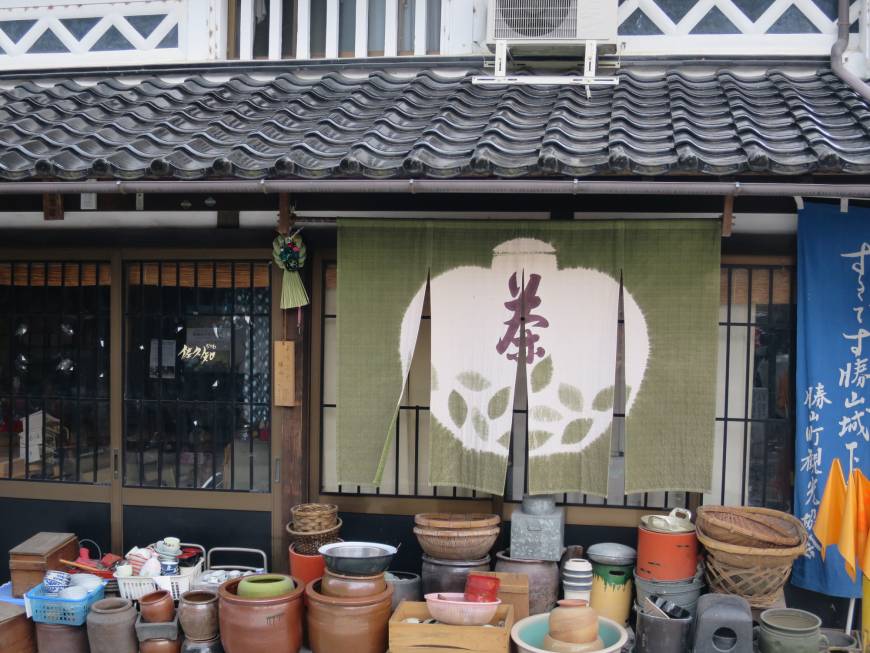 Noren hang in front of a building in Katsuyama, Okayama Prefecture.