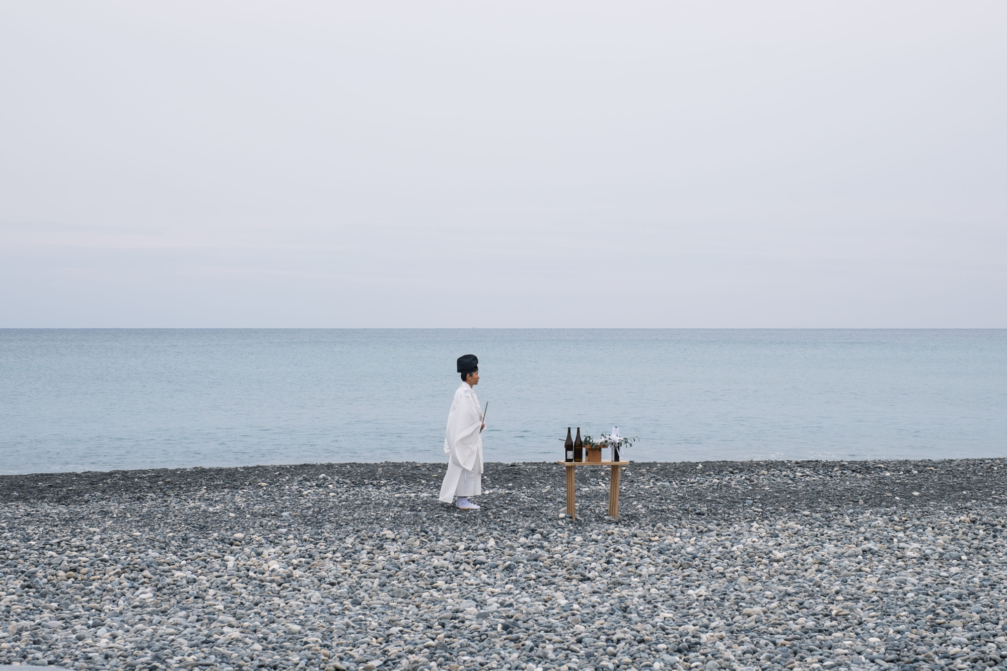 The kannushi (Shinto priest) hold a ceremony at Ojigahama Beach. | LANCE HENDERSTEIN