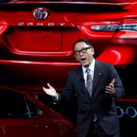 Akio Toyoda, president of Toyota Motor Corp., speaks during the North American International Auto Show in Detroit on Jan. 9. Kansai companies such as Toyota are unsure what to expect from President-elect Donald Trump. Kansai sizes up ways to work with a Trump administration