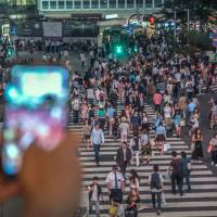 Gotcha: A camera captures images at Shibuya Crossing in Tokyo. When recording in public places in Japan, privacy and portrait rights come into play