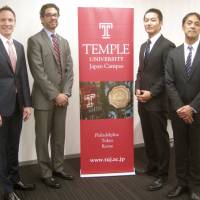 The leaders of a project exploring how collegiate athletic departments in the United States could be translated to Japan pose for a photo at Temple University Japan Campus. | KAZ NAGATSUKA