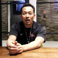 Performance director Kazuhiko Tomooka, who previously worked for the Washington Nationals franchise, speaks during a recent interview at the Dome Athlete House in Tokyo. | KAZ NAGATSUKA
