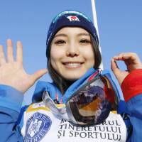 Sara Takanashi celebrates after winning the 50th World Cup event of her career on Sunday. | KYODO