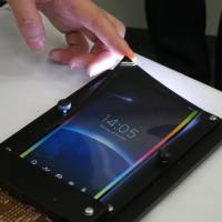 Japan Display Inc.\'s thin-plastic film display, Full Active Flex, is part of the next wave of display technology. | KAZUAKI NAGATA