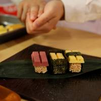 Nestle Japan\'s sushi-shaped KitKats are pictured at its new Ginza store in Tokyo on Thursday. | REUTERS
