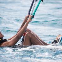 In a recent handout picture released by Virgin on Tuesday, former U.S. president Barack Obama is pictured during a kitesurfing session with British billionaire Richard Branson, off the coast of Moskito Island in the British Virgin Islands in the Caribbean. Obamas join Branson for private island getaway — and kitesurfing