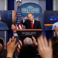 White House spokesman Sean Spicer holds a press briefing Friday in Washington. McCarthy as Spicer, Grim Reaper as Bannon as 'SNL' ratchets up satire; Trump tweet-less