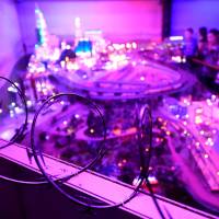 A wall with barbed wire is seen in front of the Las Vegas skyline section of the Miniature Wonderland exhibit in Hamburg, Germany, on Friday. | REUTERS