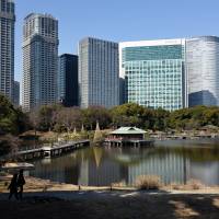 Visitors stroll through Shidome’s Hamarikyu Gardens in Chuo Ward, Tokyo, on Feb. 20. | SATOKO KAWASAKI