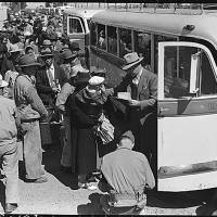 Japanese-Americans board buses on May 2, 1942, in Byron, California, in a photo taken by Dorothea Langue, who, while suffering from post-polio syndrome, tried to capture their mistreatment. | U.S. NATIONAL ARCHIVES