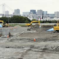 Work is underway to build the Olympic Village in Harumi, an oceanfront district in Chuo Ward. | KYODO