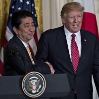 Despite the seemingly cozy ties Prime Minister Shinzo Abe built with U.S. President Donald Trump this month, students aspiring to study in America are having second thoughts about their plans. | BLOOMBERG