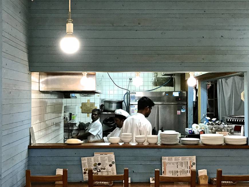 Venu’s South Indian Dining Setting the tone: A pastel blue interior welcomes guests. | ROBBIE SWINNERTON