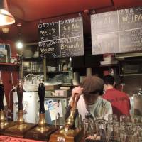 Soichiro Itsukage works one of his five hand pumps at Beer Engine in Koenji. Koenji's alehouses and brewpubs put the craft back in beer