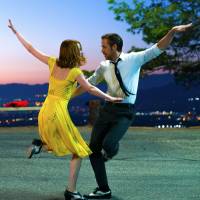 Sebastian (Ryan Gosling) and Mia (Emma Stone) in “La La Land.” 'La La Land': Sometimes we need a trip to la-la land
