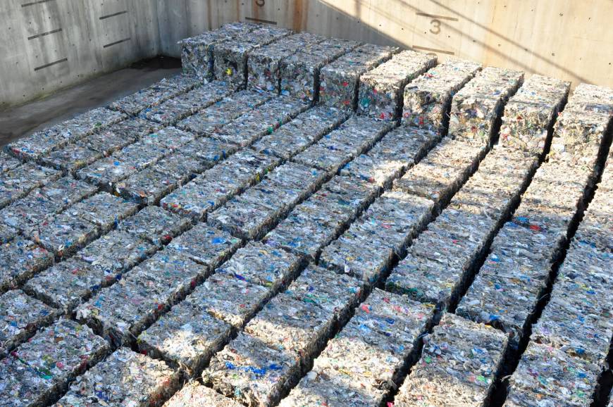 Large blocks of recovered metal sit at the Chubo Incombustible Waste Processing Center in Tokyo. | TIM HORNYAK