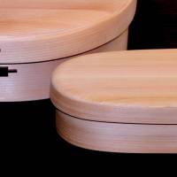 A detail of wooden bento boxes at Post Detail. | KIT NAGAMURA