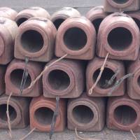Octopus pots used to catch the creatures await use on a Kimakajima pier. | KATHRYN WORTLEY