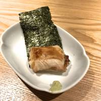 The affordable basic menu at Yakitori Imai comprises half a dozen sticks of excellent yakitori including Imai\'s trademark isobe, rare breast meat wrapped in nori seaweed. | ROBBIE SWINNERTON
