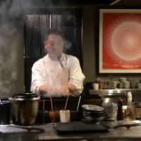 Until last summer, grillmaster Takashi Imai ran an intimate one-man operation in Sendagi. His new restaurant in
 Jingumae — which is spacious, modern and seats 30 — couldn\'t be more different.   | ROBBIE SWINNERTON