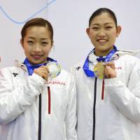 Joyful moment: Rin Nitaya (left) and Hinano Isobe show off their silver and bronze medals at last week\'s Winter Universiade in Almaty, Kazakhstan. | KYODO