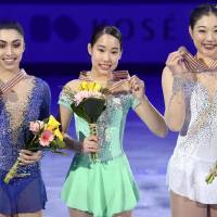 Winner Mai Mihara (center), silver medalist  Gabrielle Daleman of Canada (left) and third-place finisher Mirai Nagasu of the United States display their medals at the Four Continents Championships in Gangneung, South Korea, on Saturday night. | KYODO