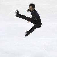 China\'s Jin Boyang performs in the men\'s short program at the Asian Winter Games on Friday in Sapporo. | AP