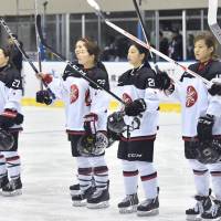 The Japan\'s women\'s hockey team salutes its fans after a 37-0 victory over Thailand at the Asian Winter Games in Sapporo on Thursday. | KYODO