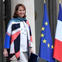 French Minister for Ecology, Sustainable Development and Energy Segolene Royal leaves after the Cabinet meeting on March 22 at the Elysee presidential palace in Paris. | AFP-JIJI