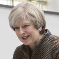British Prime Minister Theresa May talks with students at King\'s College London Mathematics School in London in this file photo. | REUTERS