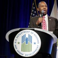 Secretary of Housing and Urban Development Ben Carson speaks to employees of the agency in Washington Monday. | REUTERS