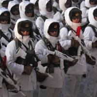 Chinese People\'s Liberation Army soldiers stand in formation during a winter training drill in Heihe, in northeastern China\'s Heilongjiang province, in January 2016. | AP