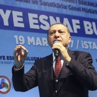 Turkish President Recep Tayyip Erdogan speaks about the upcoming 16 April referendum during a meeting with his supporters in Istanbul late Sunday. Opposition figures in Turkey say they have faced threats, violence, arbitrary detentions, a lack of TV airtime and even sabotage in the campaign for a referendum on expanding the president’s powers. Erdogan has 'gone too far' with Nazi slur, Germany says as Turkish tensions mount across EU