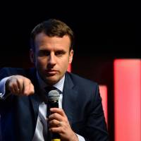 French presidential candidate Emmanuel Macron delivers a speech during a meeting with French employers association Medef in Paris on Tuesday. | AFP-JIJI