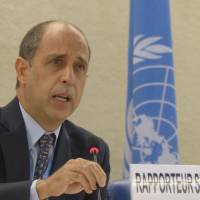 Tomas Ojea Quintana, the U.N. special rapporteur on human rights in North Korea, speaks to the Human Rights Council in Geneva on Monday. | AP
