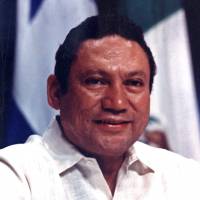 Panamanian strongman Manuel Noriega takes part in a news conference in Panama City on Oct. 11, 1989. | REUTERS