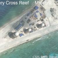Report warns that Beijing's military bases in South China Sea are ready for use