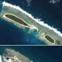 A combination of satellite photos shows Chinese-controlled North Island, part of the Paracel group in the South China Sea, on Feb. 15 (top) and on March 6. | REUTERS