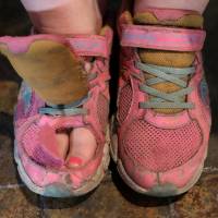 Shannon Winckler waits for her shoes to be judged in the National Rotten Sneaker Contest in New York on Tuesday. | REUTERS