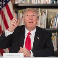 U.S. President Donald Trump speaks during a meeting with parents and teachers at Saint Andrew Catholic School in Orlando, Florida, on Friday. | AFP-JIJI