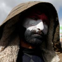 A Yemeni attends a rally in support of the Houthi movement and former President Ali Abdullah Saleh in Sanaa on Sunday. | REUTERS
