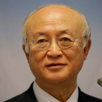 International Atomic Energy Agency (IAEA) Director General Yukiya Amano addresses a news conference after a board of governors meeting at the IAEA headquarters in Vienna Monday. | REUTERS