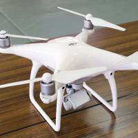 A drone confiscated from a man who allegedly flew it in a prohibited area in Kitakyushu is shown to the media Friday at a police station in the city. | KYODO